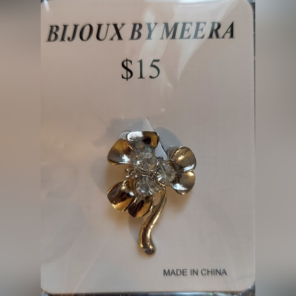 Two Meera pin/brooch